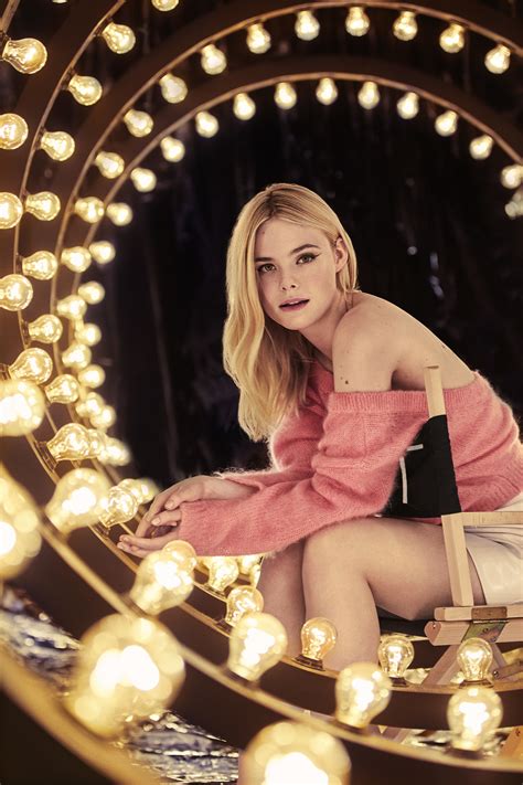 elle fanning perfume campaign.